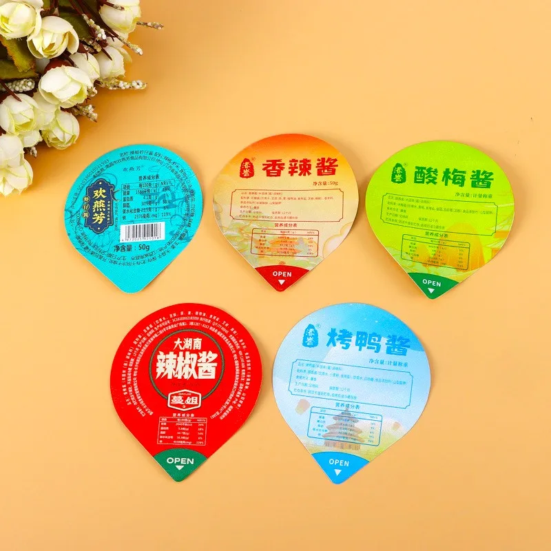 H5b0737d148c642e68342a3f929e78bbeZ.webp YBLPAK Heat Seal Embossed Aluminum Foil Lid Sealing Film for Instant Noodle Cheese Yogurt Jelly Ice Cream Packaging Cups Sealing - 画像 (1)