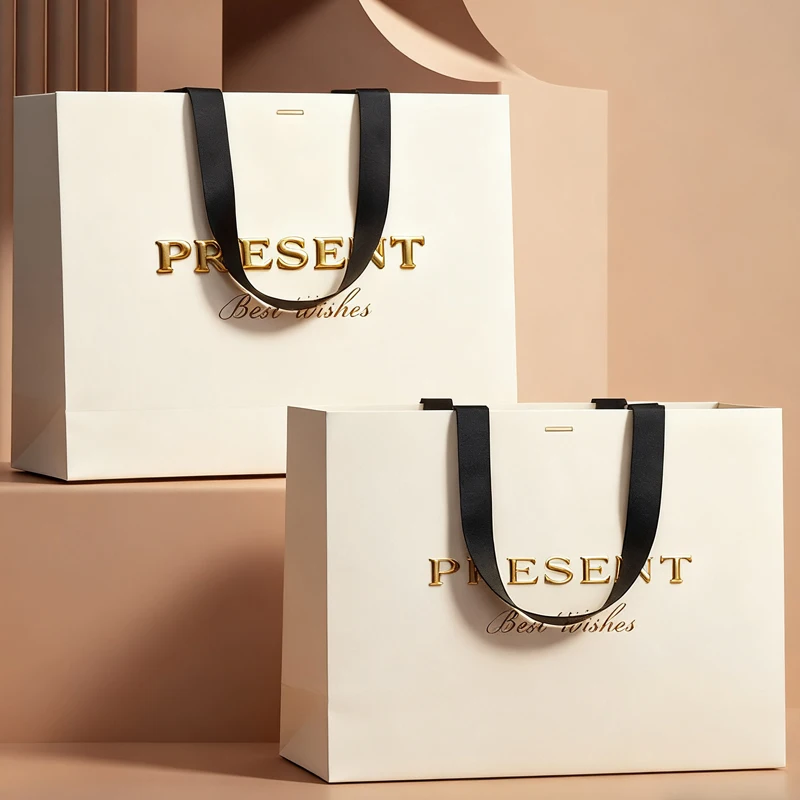 Hfc4b907d5dda476e93e17363ade73151I.webp Wholesale Custom Printed Brand Logo Design Promotion Luxury Clothing Retail Gift Shopping Jewellery Paper Bag With Handle - 画像 (1)